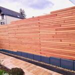 7.0 cm slats of IPE hardwood a modern fence